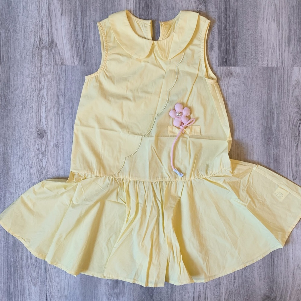 Designer girl’s dress(very new, flower can be removed)
